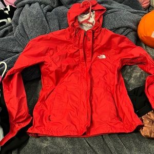 Red north face windbreaker